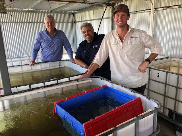 QRIDA CEO Cameron MacMillan with Regional Area Manager, Angelo Rigano and First Start Loan client, Nathan Cleasby.